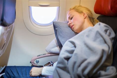 how to fall asleep on an airplane